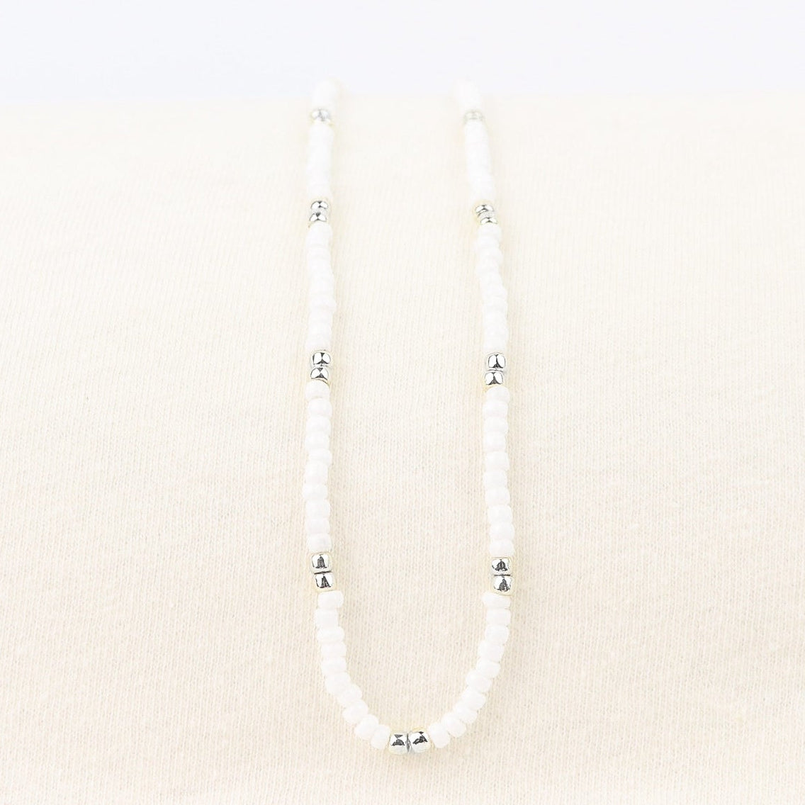 POT OF SILVER NECKLACE