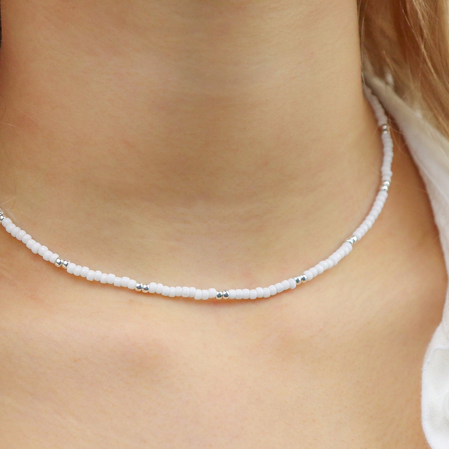 POT OF SILVER NECKLACE